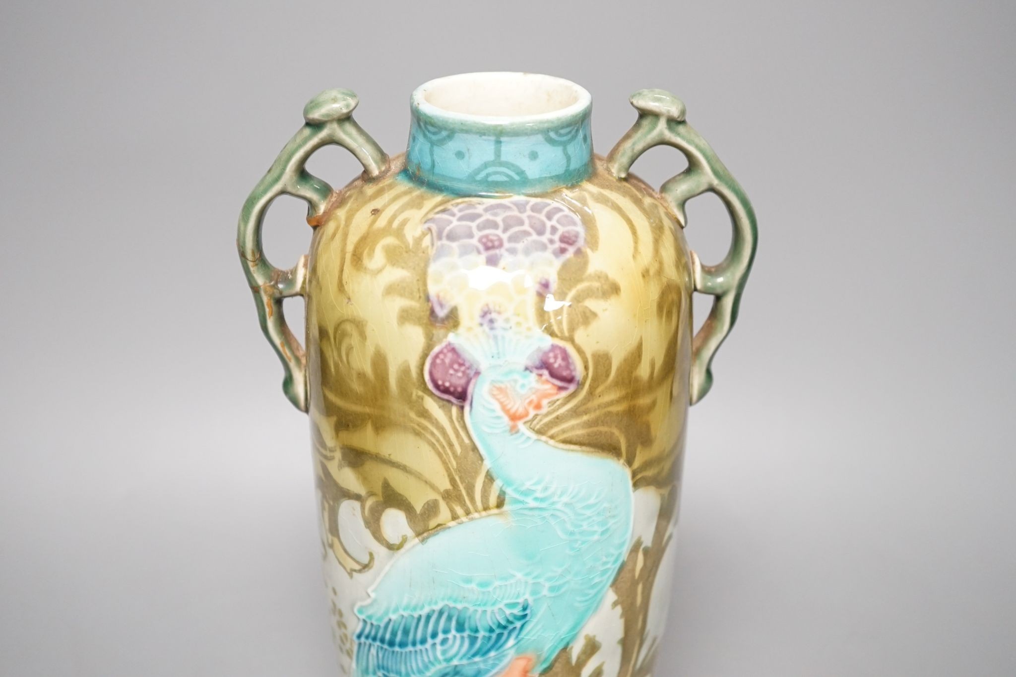 An Art Nouveau/Secessionist style Mintons ‘peacock’ vase (a.f.) 29cm